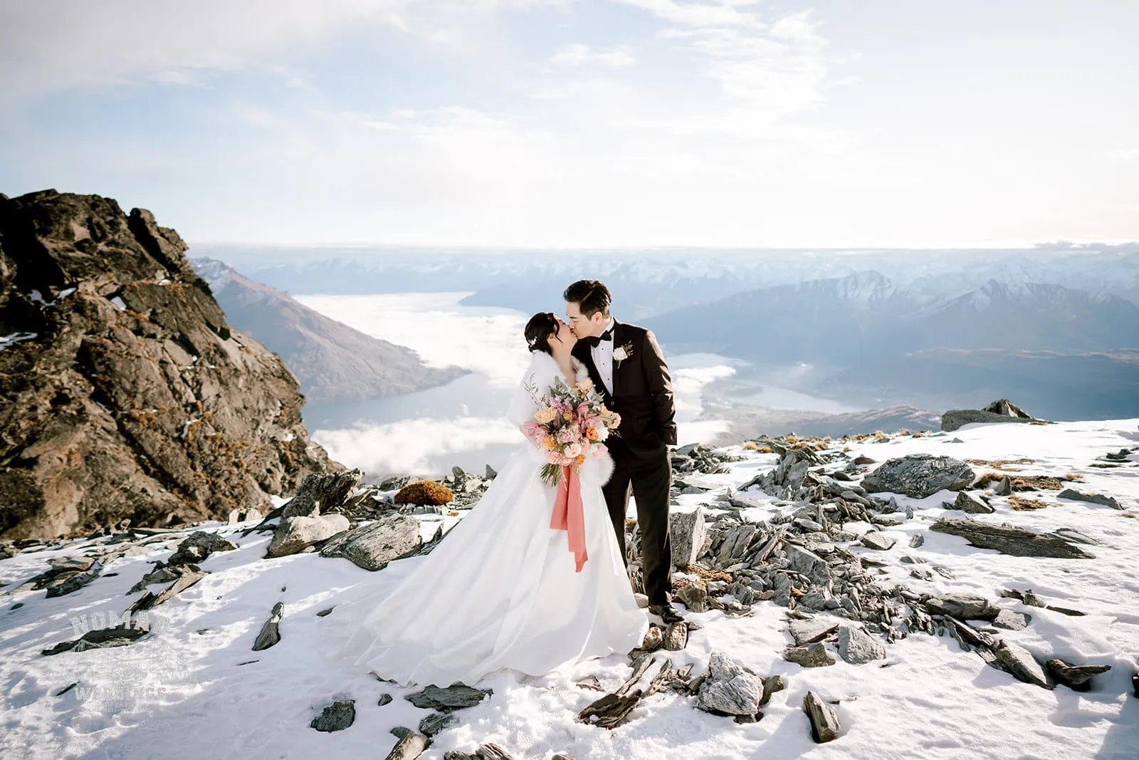 Queenstown New Zealand Elopement Wedding Photographer - Bo and Junyi's heli pre wedding shoot atop a snow covered mountain with 4 landings.