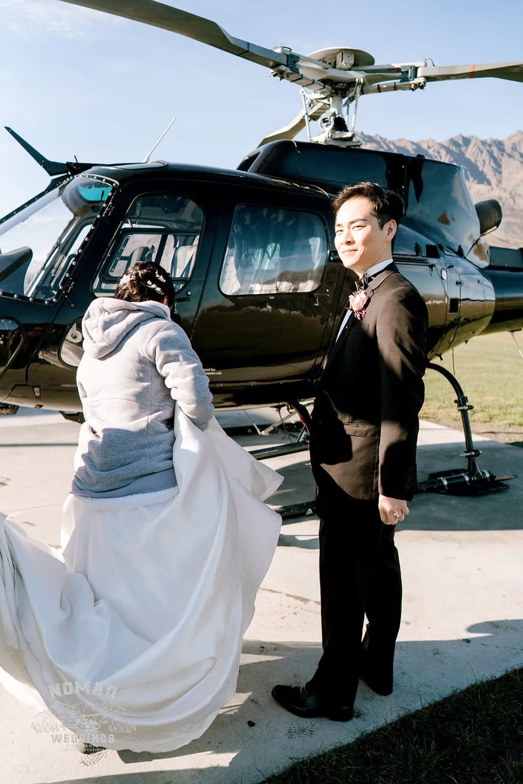Queenstown New Zealand Elopement Wedding Photographer - Bo and Junyi posing in a helicopter for their Heli Pre Wedding Shoot with 4 Landings.