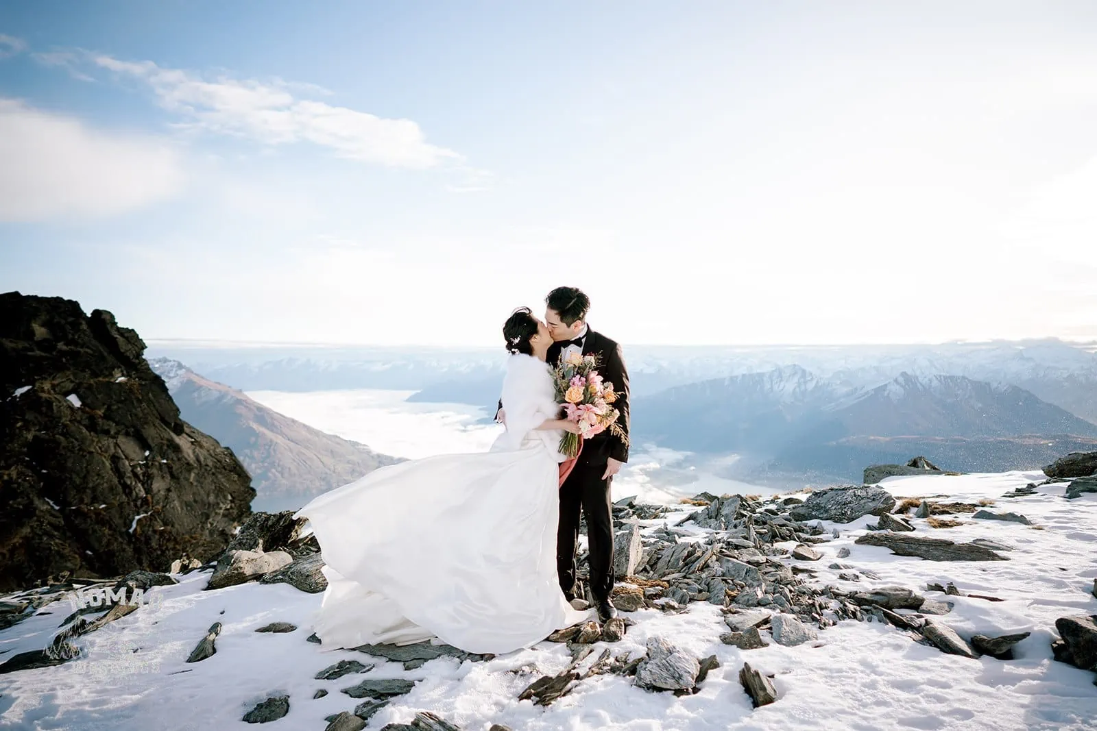Queenstown New Zealand Elopement Wedding Photographer - Bo and Junyi's heli pre-wedding shoot on a snow-covered mountain with 4 landings.