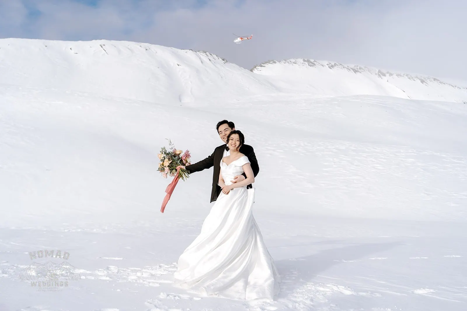 Queenstown New Zealand Elopement Wedding Photographer - Bo and Junyi's pre-wedding shoot in the snow featuring 4 helicopter landings.