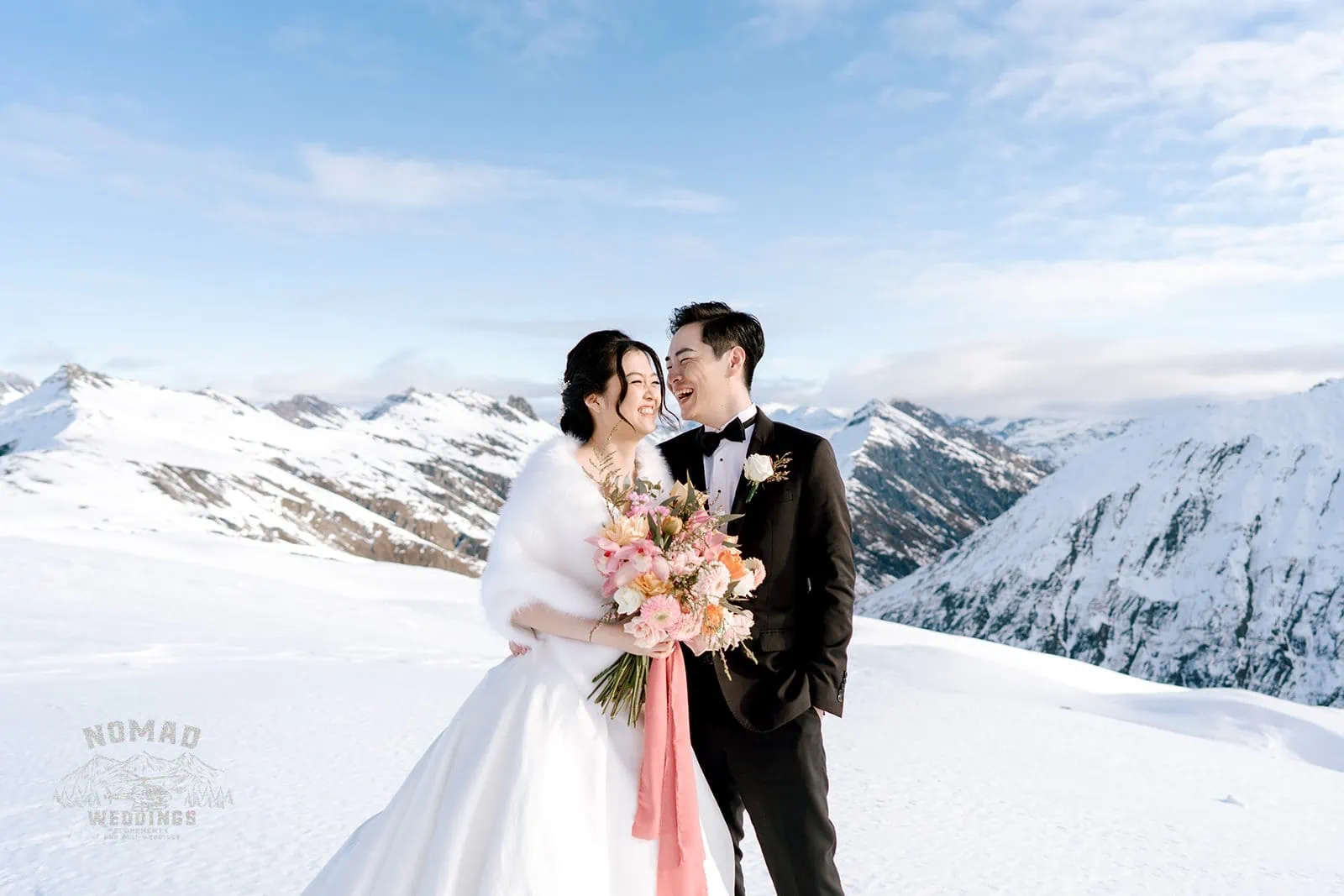 Queenstown New Zealand Elopement Wedding Photographer - Bo and Junyi, a bride and groom, embark on a breathtaking Heli Pre Wedding Shoot atop a snow-covered mountain with 4 thrilling landings.
