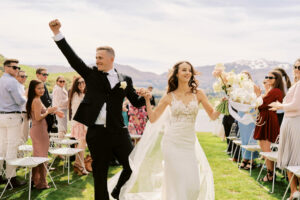 Queenstown New Zealand Elopement Wedding Photographer - Josh captures a bride and groom walking down the aisle at a wedding in New Zealand for his portfolio.