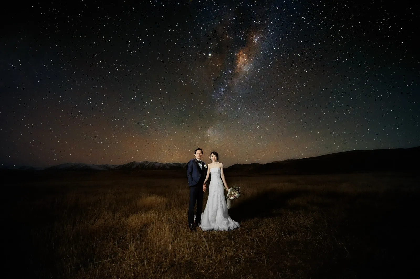 Queenstown New Zealand Elopement Wedding Photographer - A stunning bride and groom captured in a mesmerizing Starry Night Shoot.