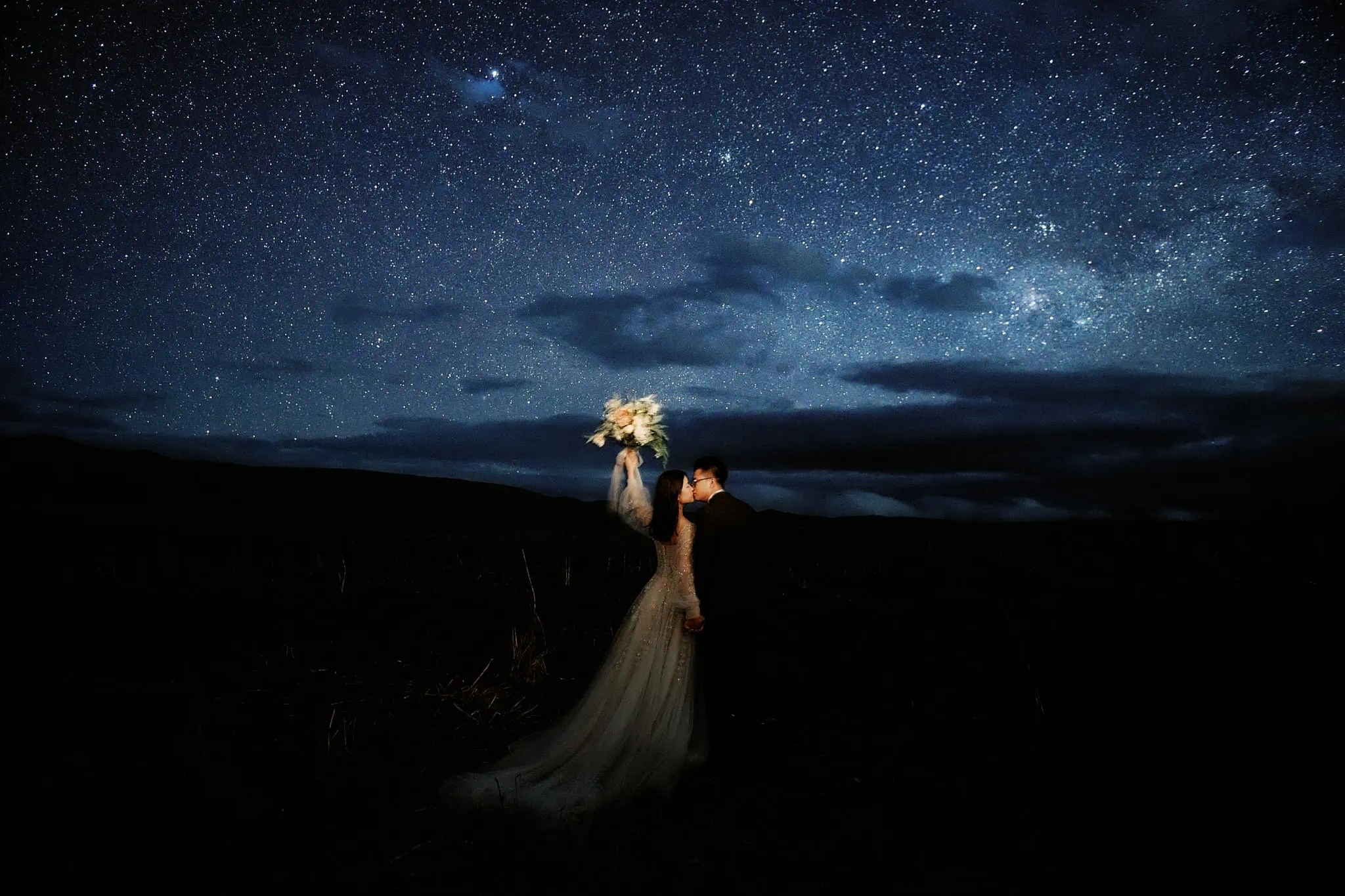 Queenstown New Zealand Elopement Wedding Photographer - A starry night shoot featuring a bride and groom in our portfolio.