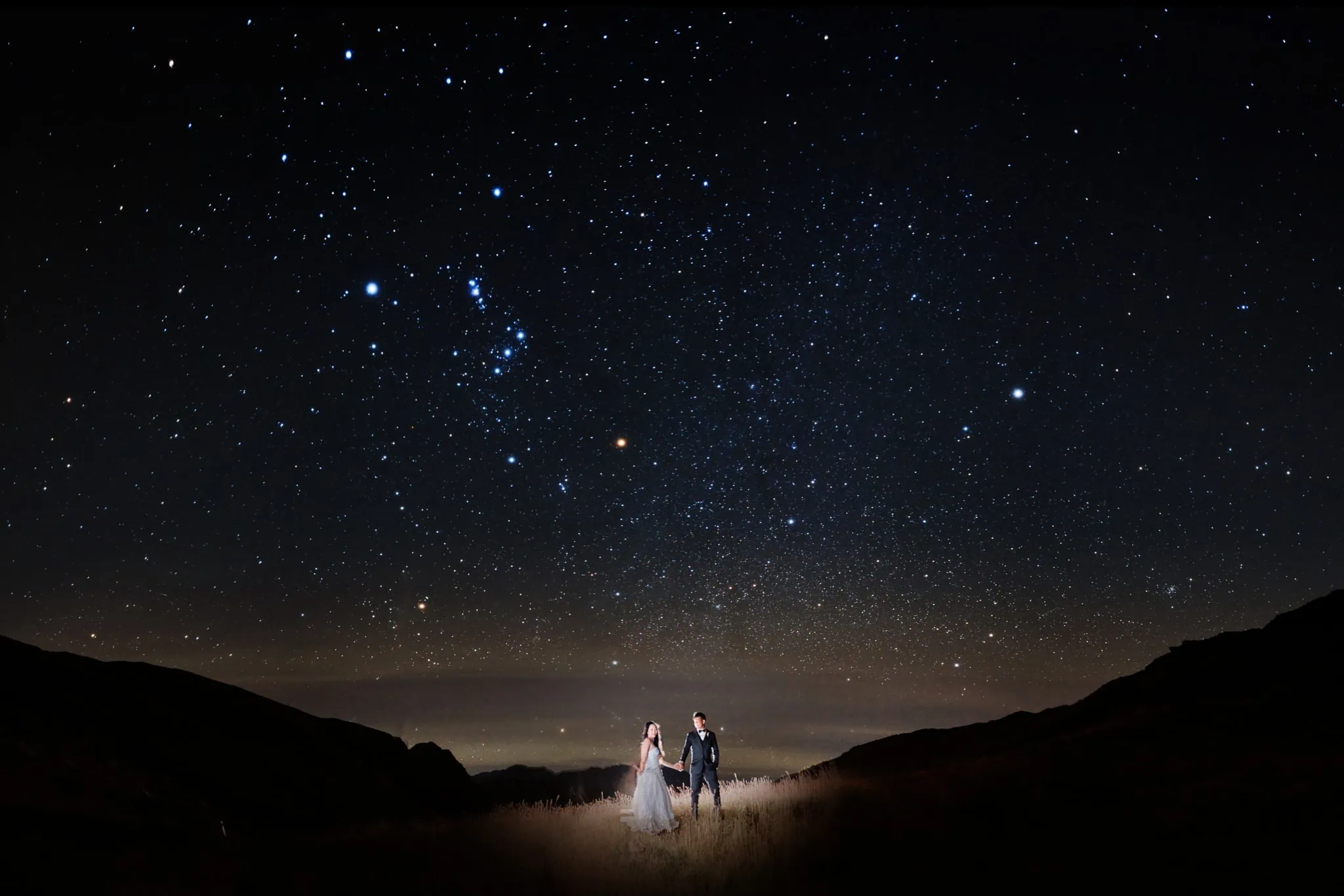 Queenstown New Zealand Elopement Wedding Photographer - A Starry Night Shoot featuring a bride and groom under a starry sky, showcased in our Portfolio.