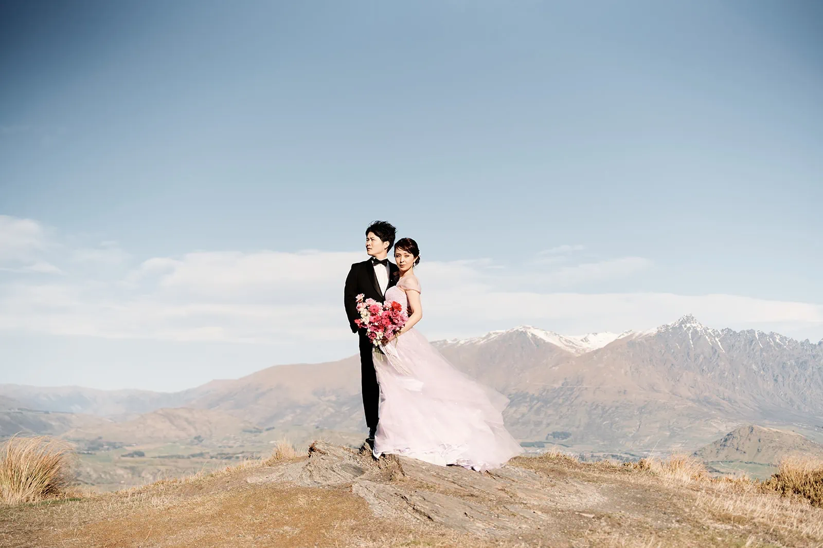 Queenstown New Zealand Elopement Wedding Photographer - A bride and groom elopement on top of Coronet Peak in New Zealand.
