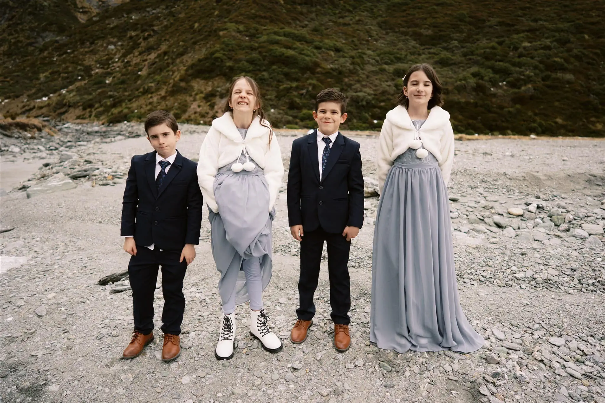 Queenstown New Zealand Elopement Wedding Photographer - Shahar and Alex, two children in formal attire, posing for a photo.