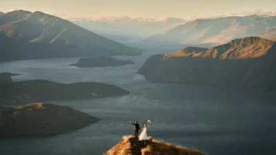 Queenstown New Zealand Elopement Wedding Photographer - A bride and groom on Coromandel Peak, overlooking Lake Wanaka.