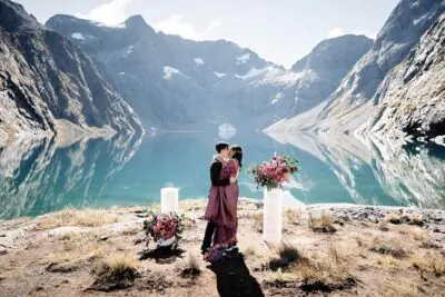 Queenstown New Zealand Elopement Wedding Photographer - A bride and groom standing in front of Lake Erskine.