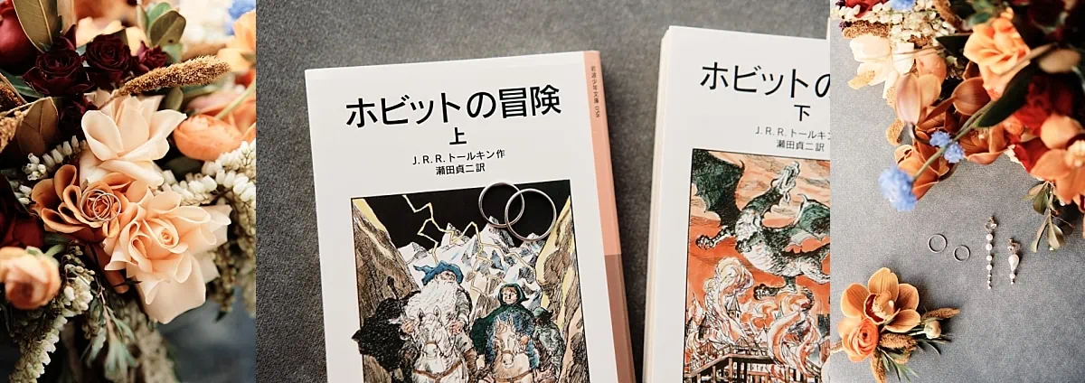 Queenstown Wedding Photographer Japanese books on a table next to a bouquet of flowers in Queenstown.