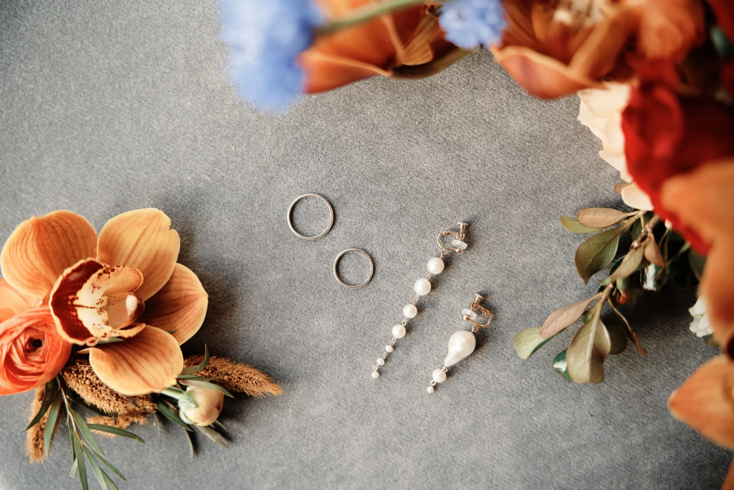 Queenstown Wedding Photographer A bouquet of flowers and a pair of earrings gifted by Atsushi.