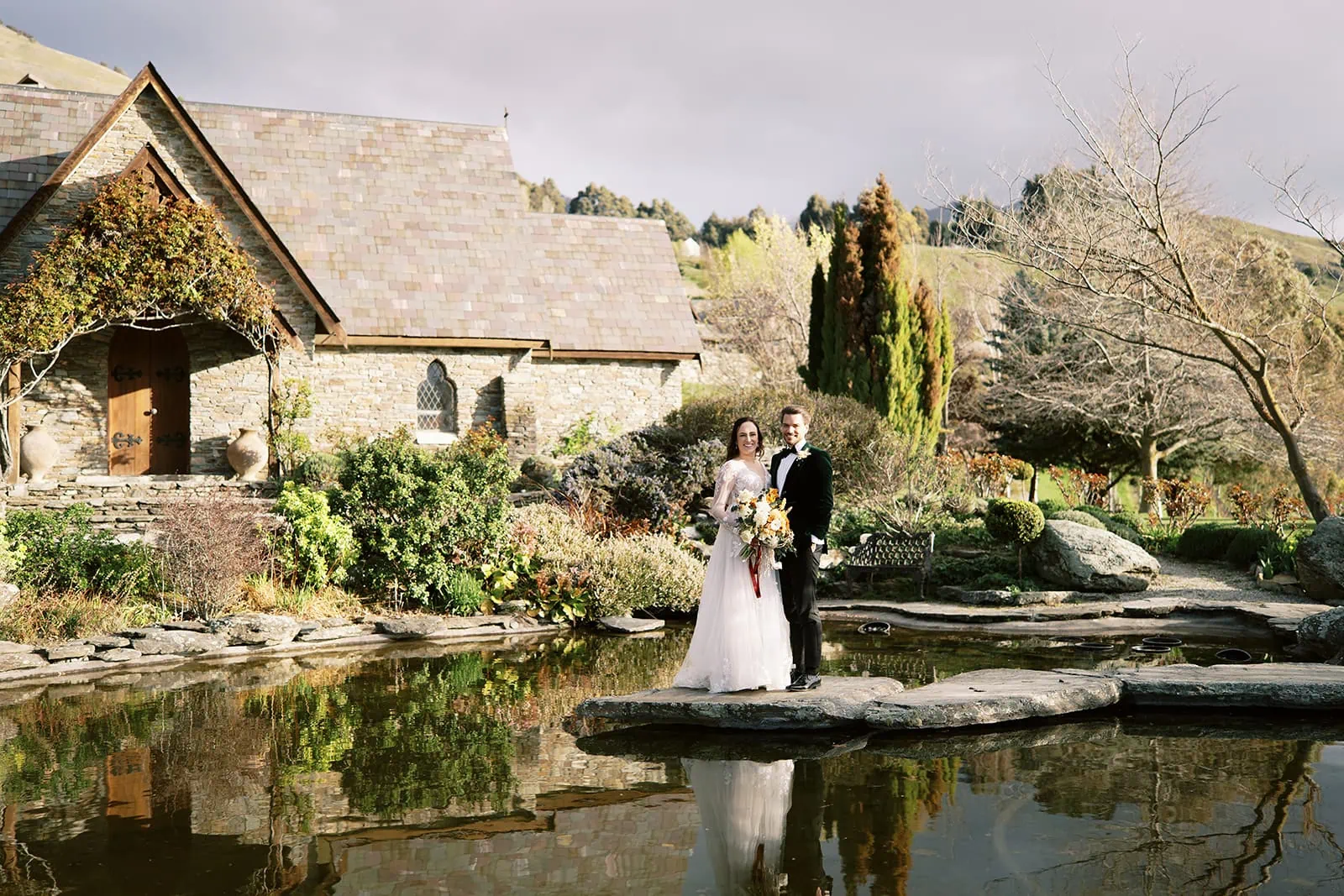 Queenstown Wedding Photographer Nat & Tim's Queenstown elopement wedding captured at Deer Park Heights, with the picturesque backdrop of a pond.