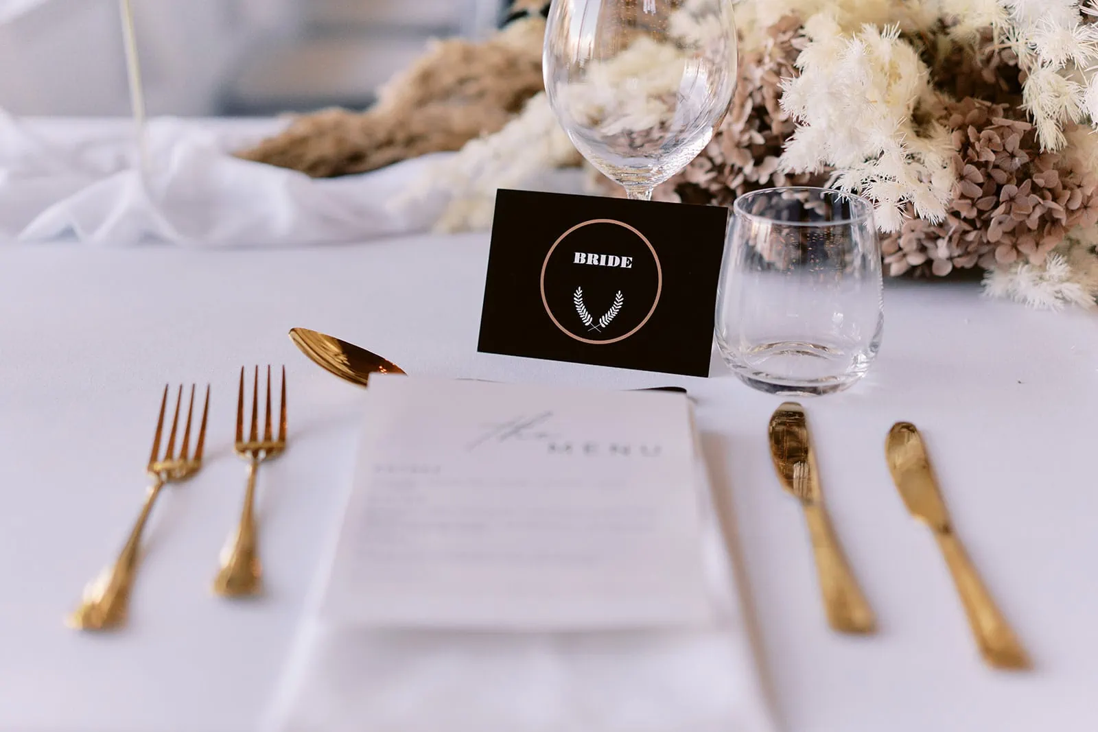 Queenstown Elopement Heli Wedding Photographer クイーンズタウン結婚式 | A table setting with a place card and forks at the Kamana Lakehouse Queenstown Elopement