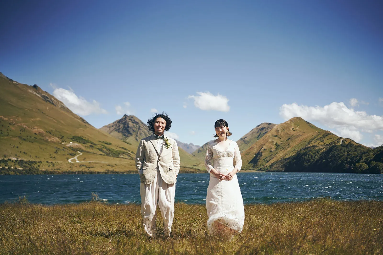 Queenstown Elopement Heli Wedding Photographer クイーンズタウン結婚式 | Eriko & Naoki, a beautiful bride and groom, captured their love in an enchanting Heli Pre-Wedding Shoot amidst the picturesque landscapes of Queenstown. Standing together in