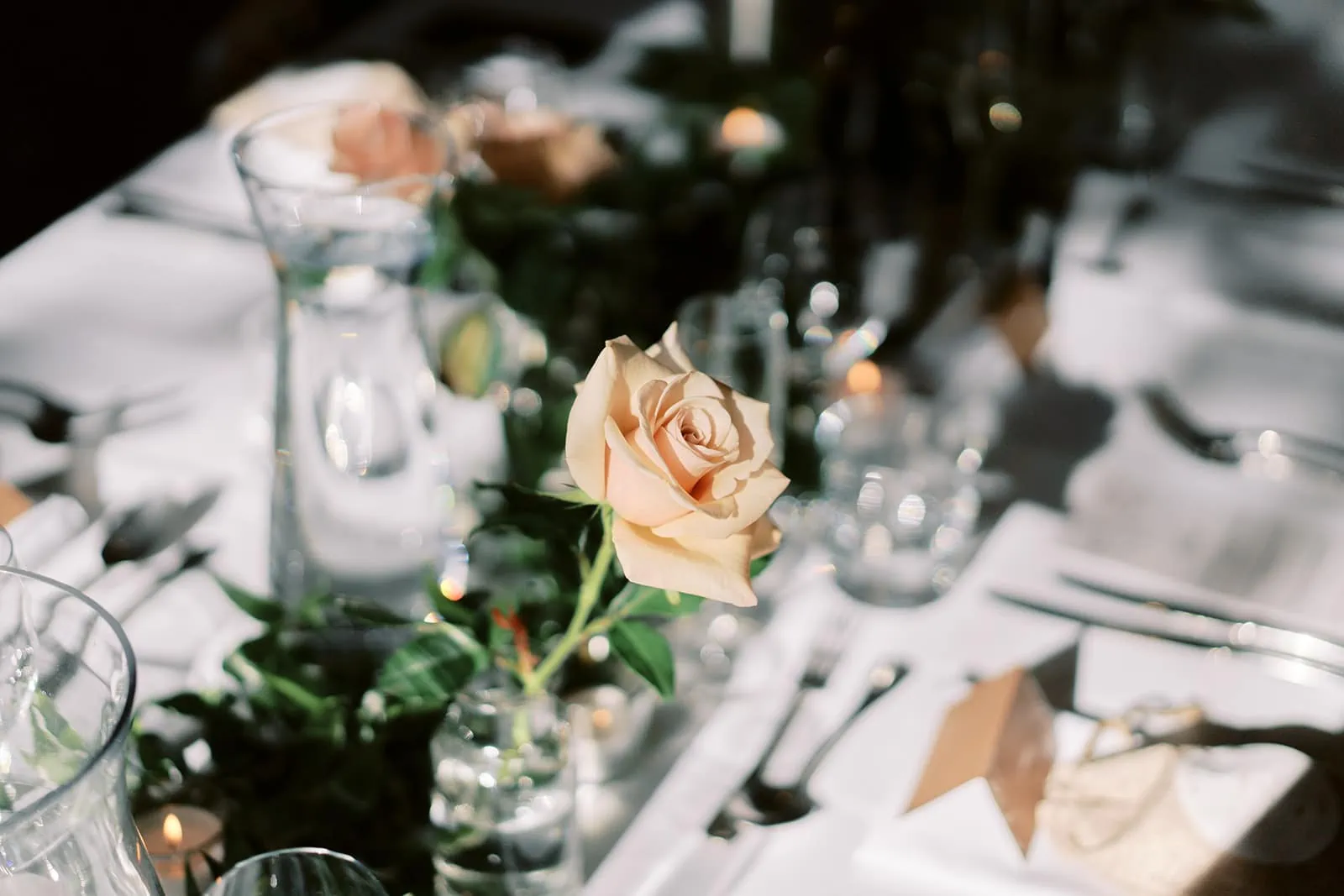 Queenstown Elopement Heli Wedding Photographer クイーンズタウン結婚式 | A Stoneridge Queenstown Wedding table with a rose on it.