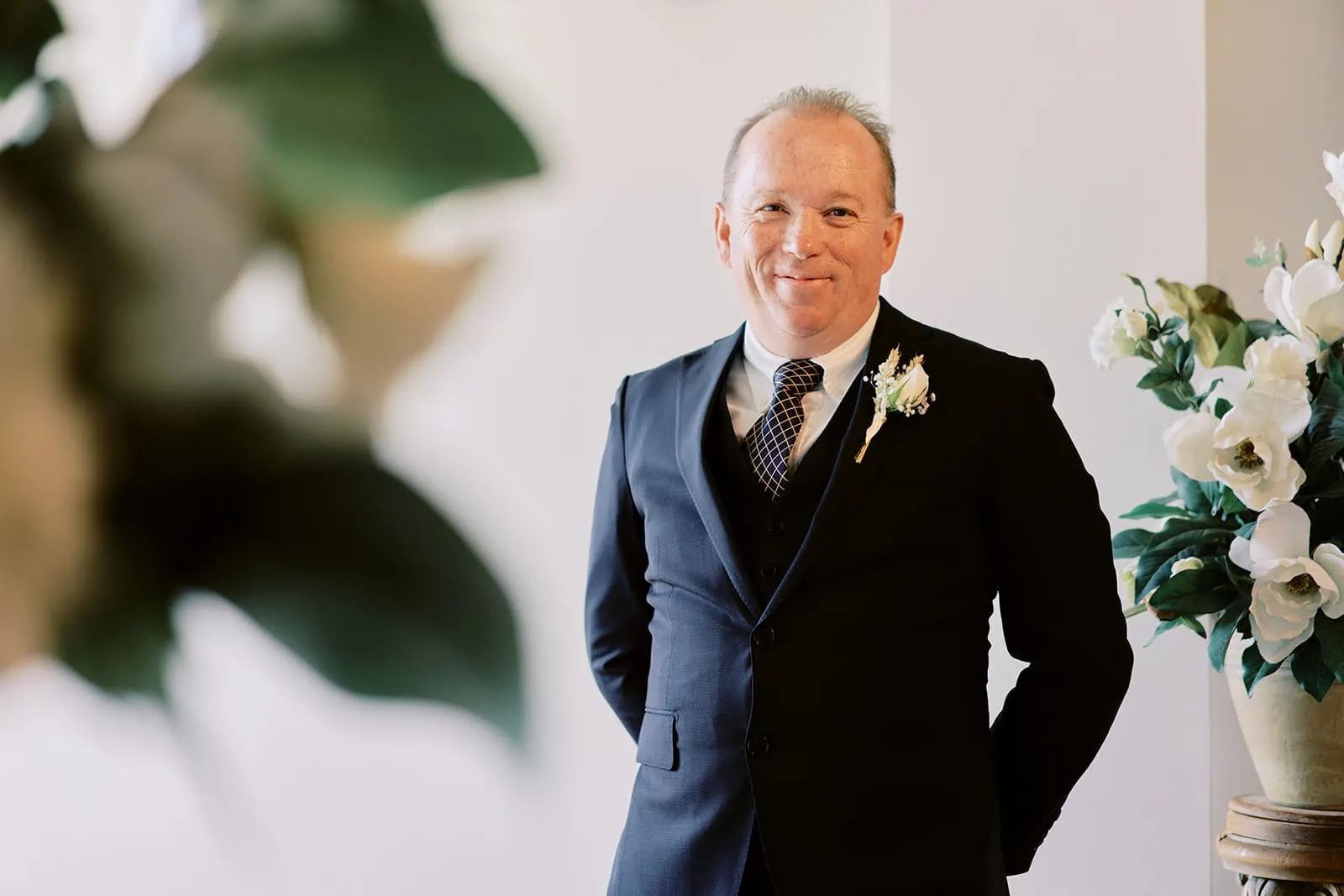Queenstown Elopement Heli Wedding Photographer クイーンズタウン結婚式 | Joel, a man in a suit, at Stoneridge Estate.
